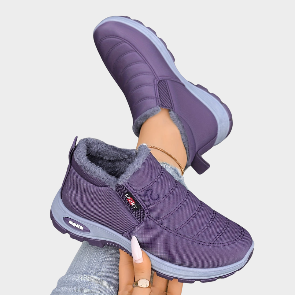 Violet fur-lined ankle boots with elastic side and chunky light outsole