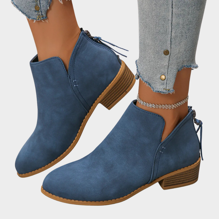 Blue suede low-heel ankle boot with side tie and stacked block heel