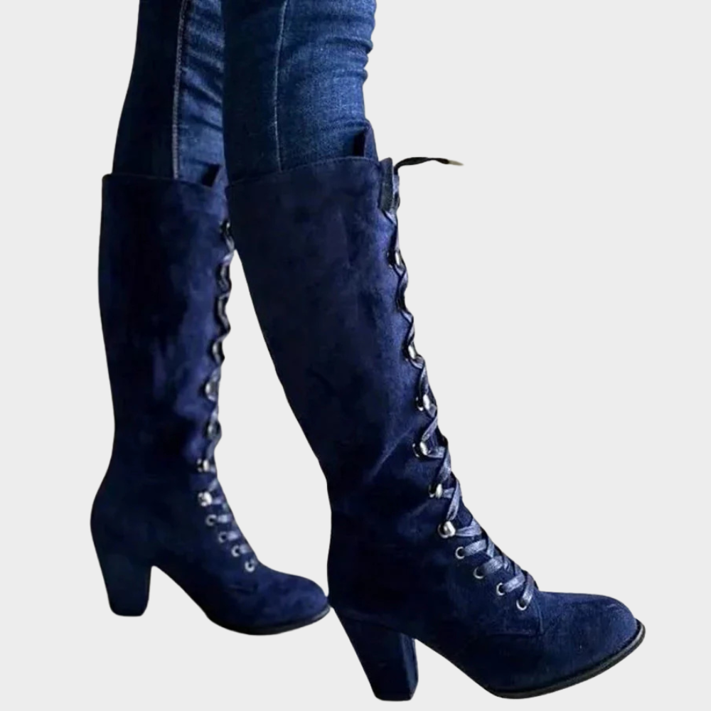 Dark blue suede lace-up high heel boots, side view with lace-up shaft.