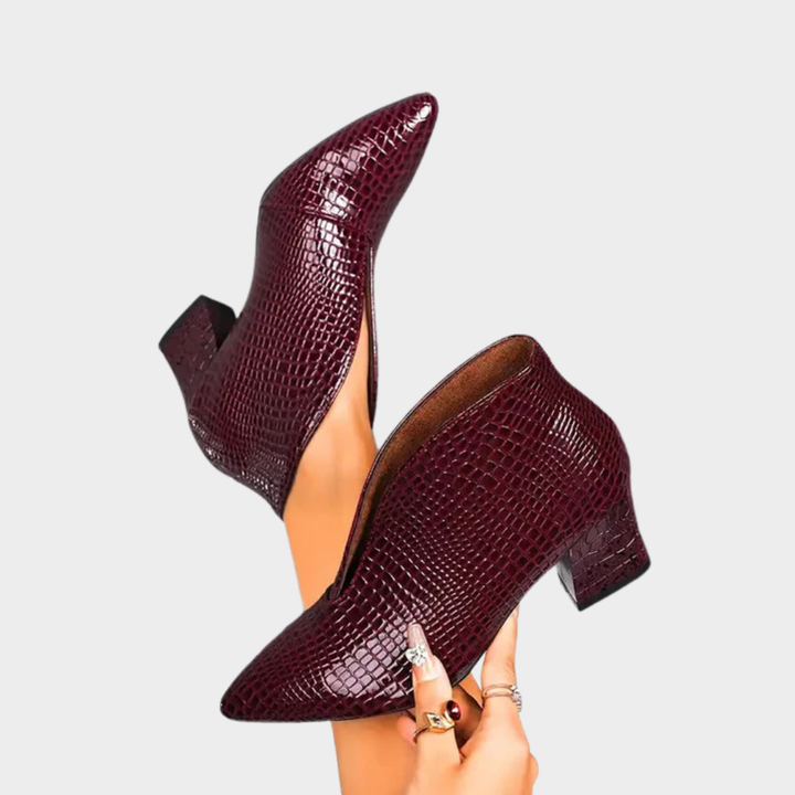 Dark red V-cut ankle boots with textured finish and block heel