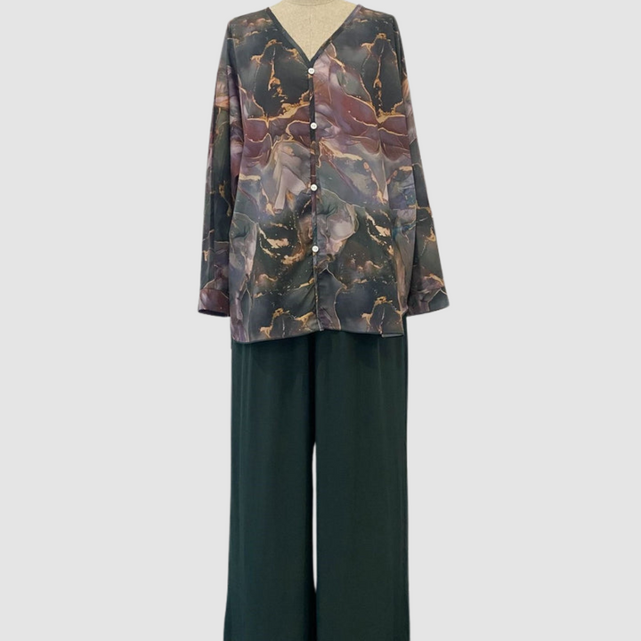 Printed blouse and wide-leg pants set with dark abstract floral print and button front