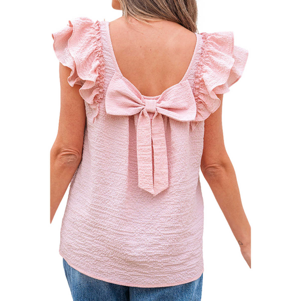 Pink textured back of summer top with bow-tie, open back and ruffled shoulder