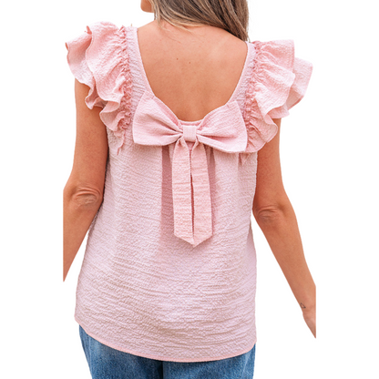 Pink textured back of summer top with bow-tie, open back and ruffled shoulder