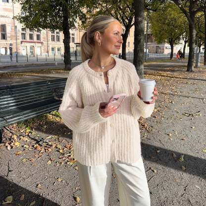 Cream button-front round-neck long-sleeve knit cardigan with textured ribbing