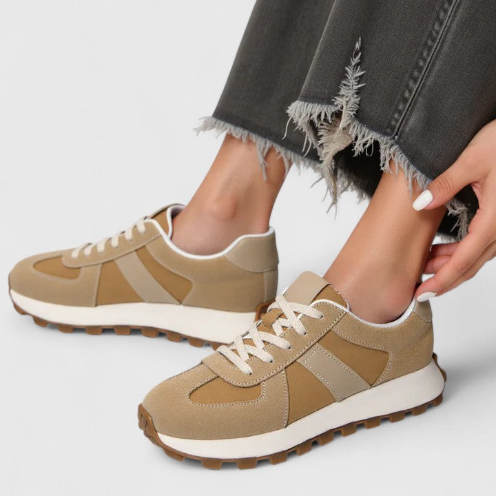 Tan and beige lace-up sneakers with white midsole and brown traction tread