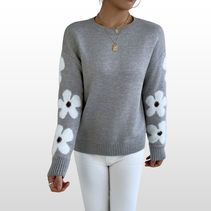 Gray round-neck sweater with white flower patches on sleeves and ribbed hem
