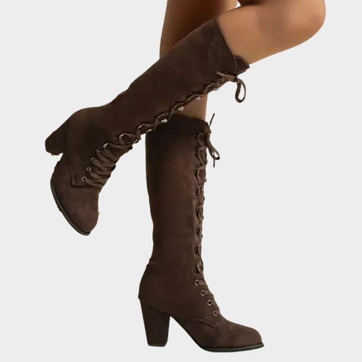 Brown suede lace-up high heel boots, side view with ankle laces and block heel.