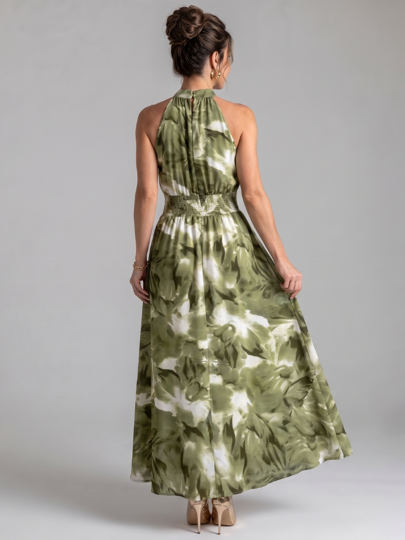 Green abstract print midi dress with halter neck and gathered waist, back view