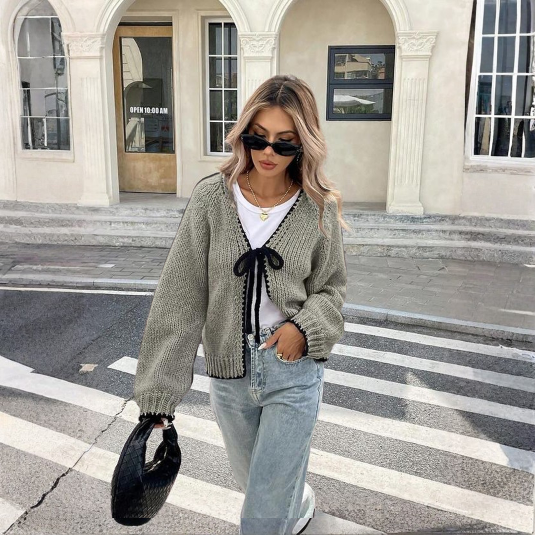 Olive-gray knit cardigan with front tie and long sleeves, ribbed cuffs and hem.