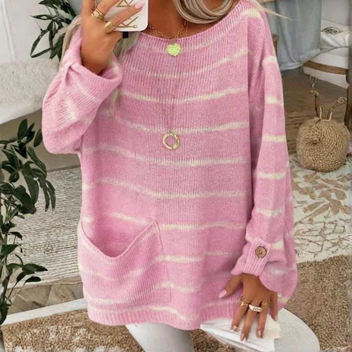 Pink knit sweater with cream stripe bands, round neck, long sleeves, front pocket