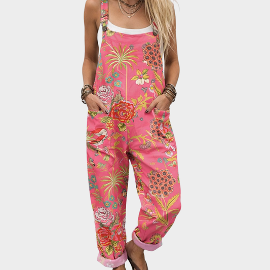 Pink printed overalls with wide straps and roomy straight legs