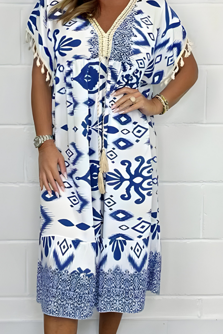Blue and white midi dress with tassel-trim sleeves, tassel tie, V-neck