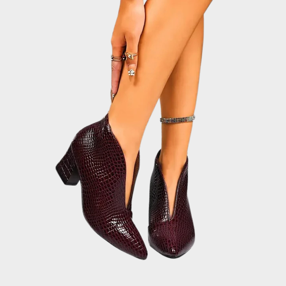 Dark red V-cut ankle boots with textured finish and block heel