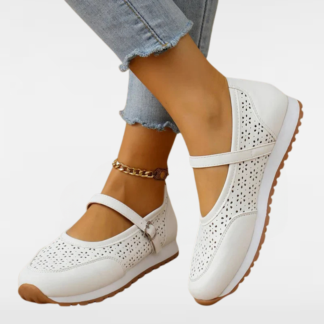 Women's white perforated Mary Jane sneakers with ankle strap and soft rubber sole