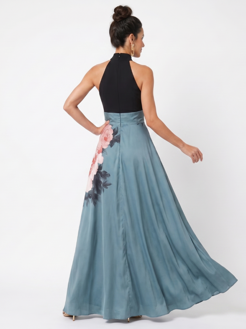 Halter maxi dress with black halter neckline and teal skirt with pink floral accents