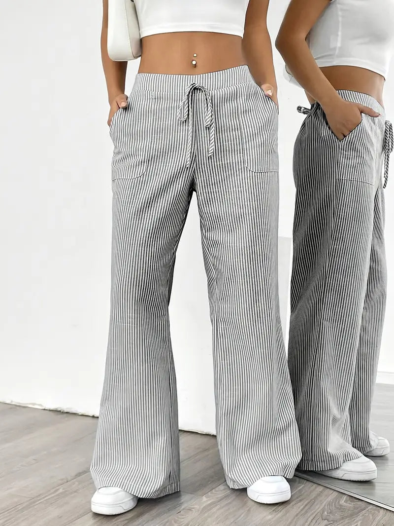 Striped wide-leg pants with drawstring waist and side pockets, black-and-white pinstripe texture