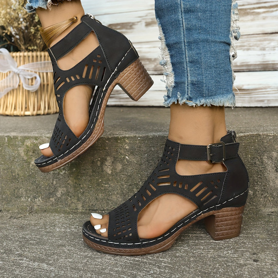 Black ergonomic sandals with peep-toe cutouts and woven-texture block heel
