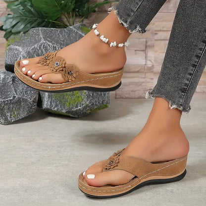 Tan/brown orthopedic sandals with floral front strap and cushioned sole