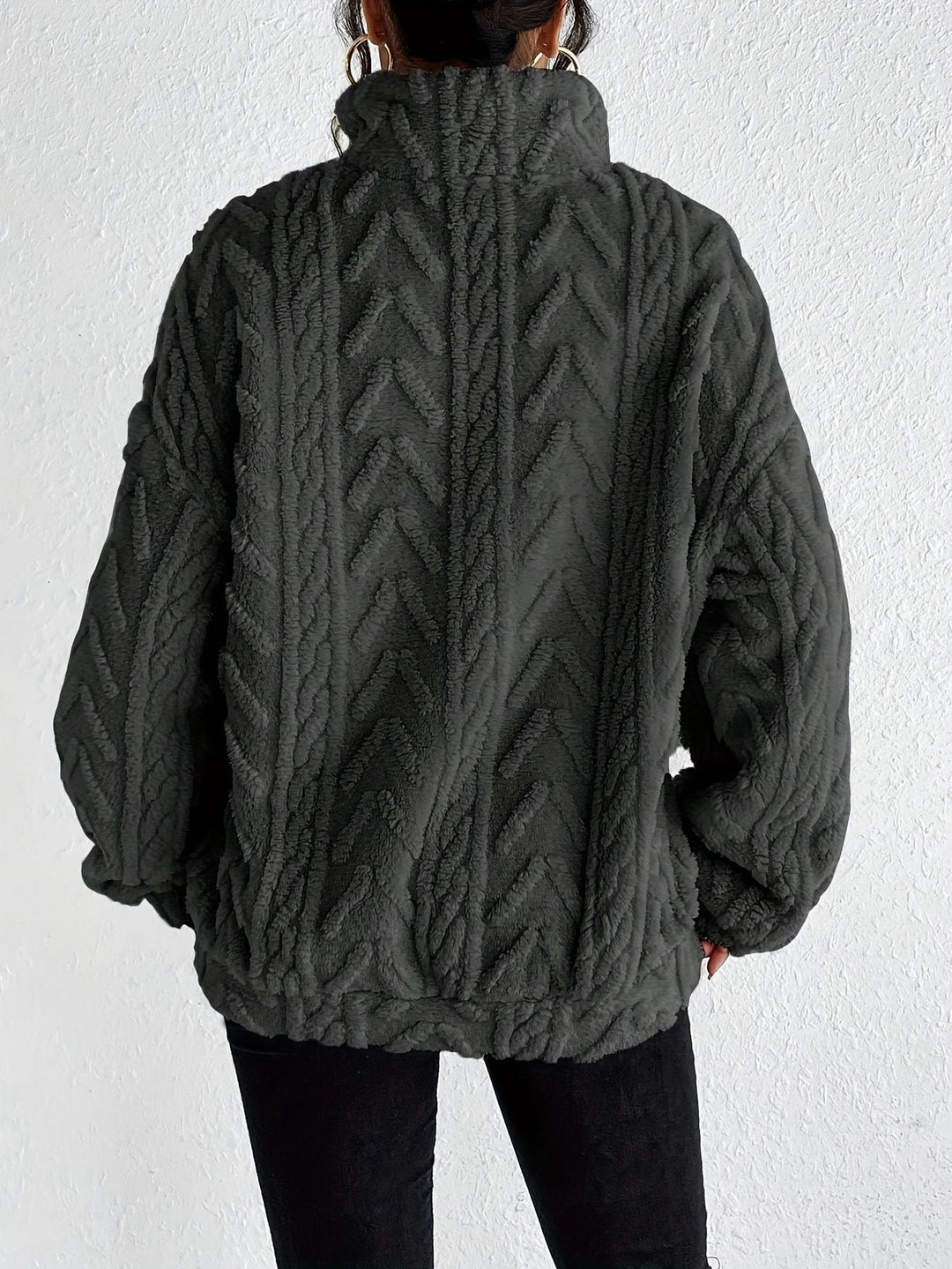 Warm knit quarter-zip sweater in dark gray, cable texture, long sleeves, back view.