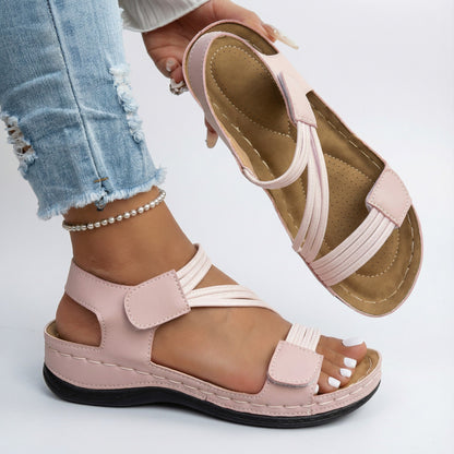 Orthopedic comfort sandals, light pink straps with buckle closure and cushioned sole