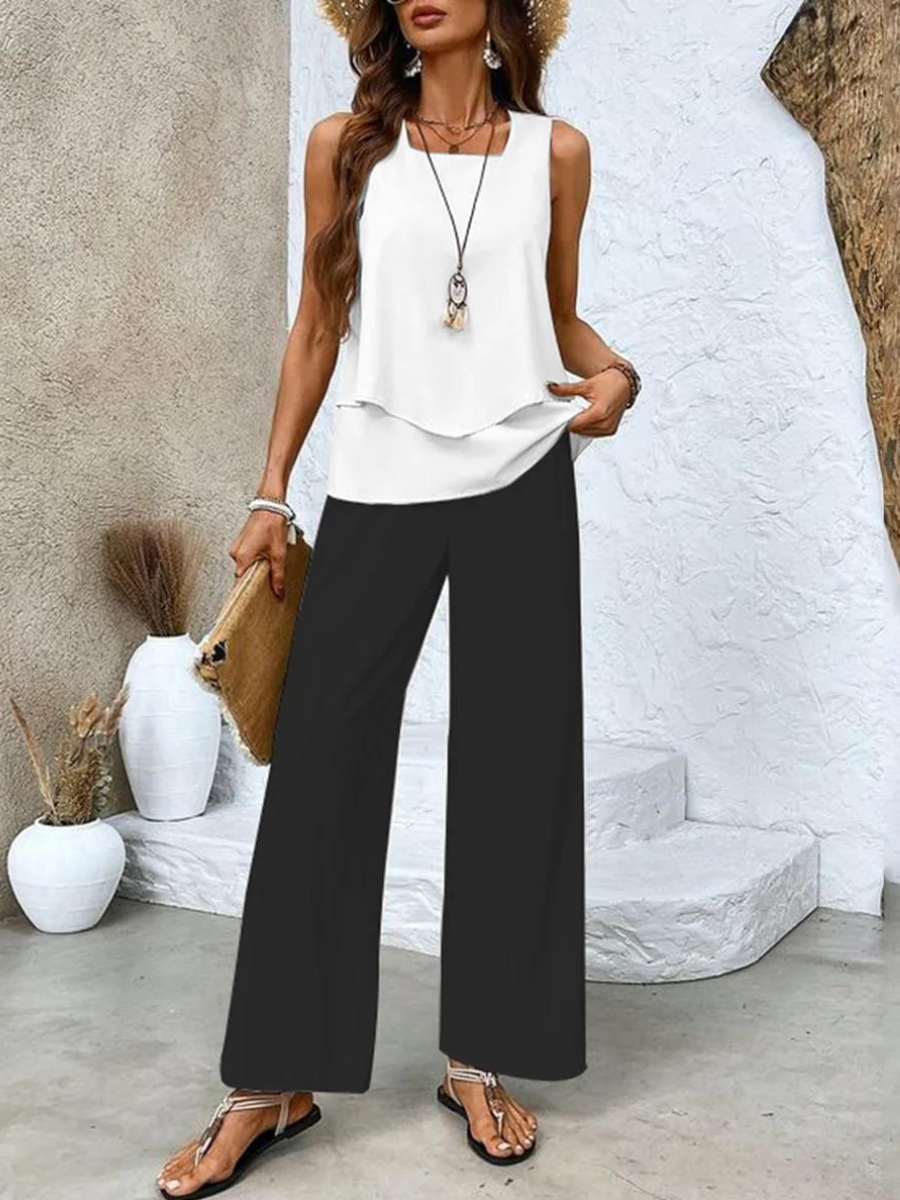 Black sleeveless blouse and wide-leg trousers, two-piece set