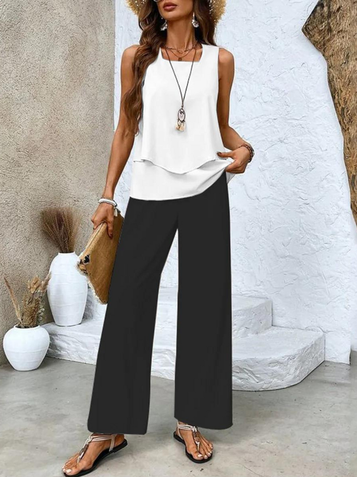 Black sleeveless blouse and wide-leg trousers, two-piece set
