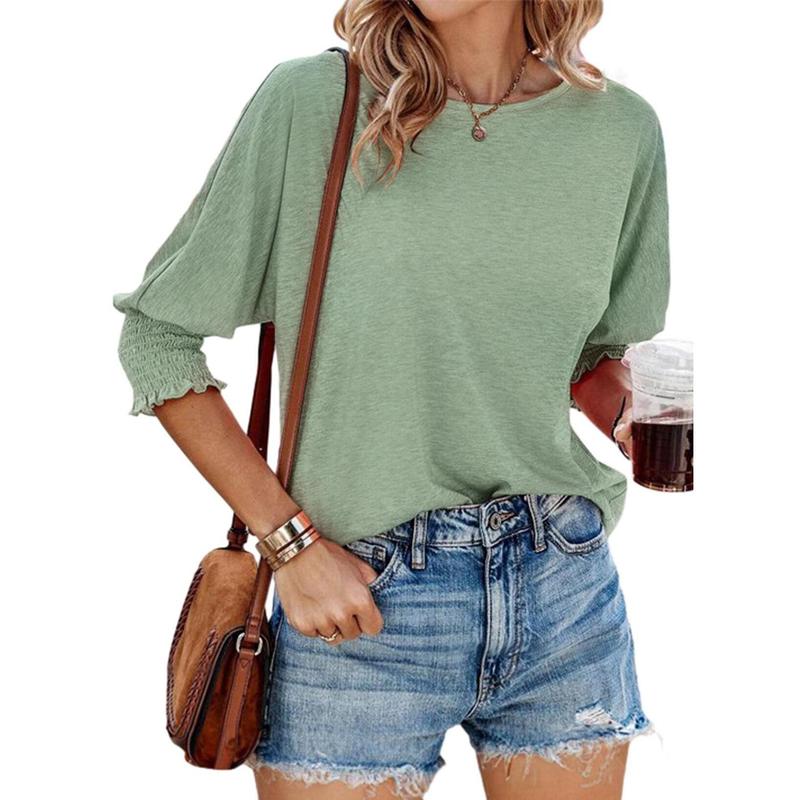Light green lightweight short-sleeve blouse with gathered cuffs and relaxed fit