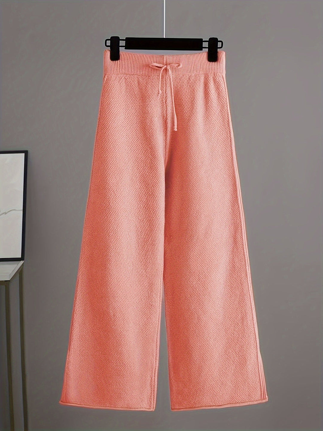 Apricot wide-leg knit trousers with drawstring waistband