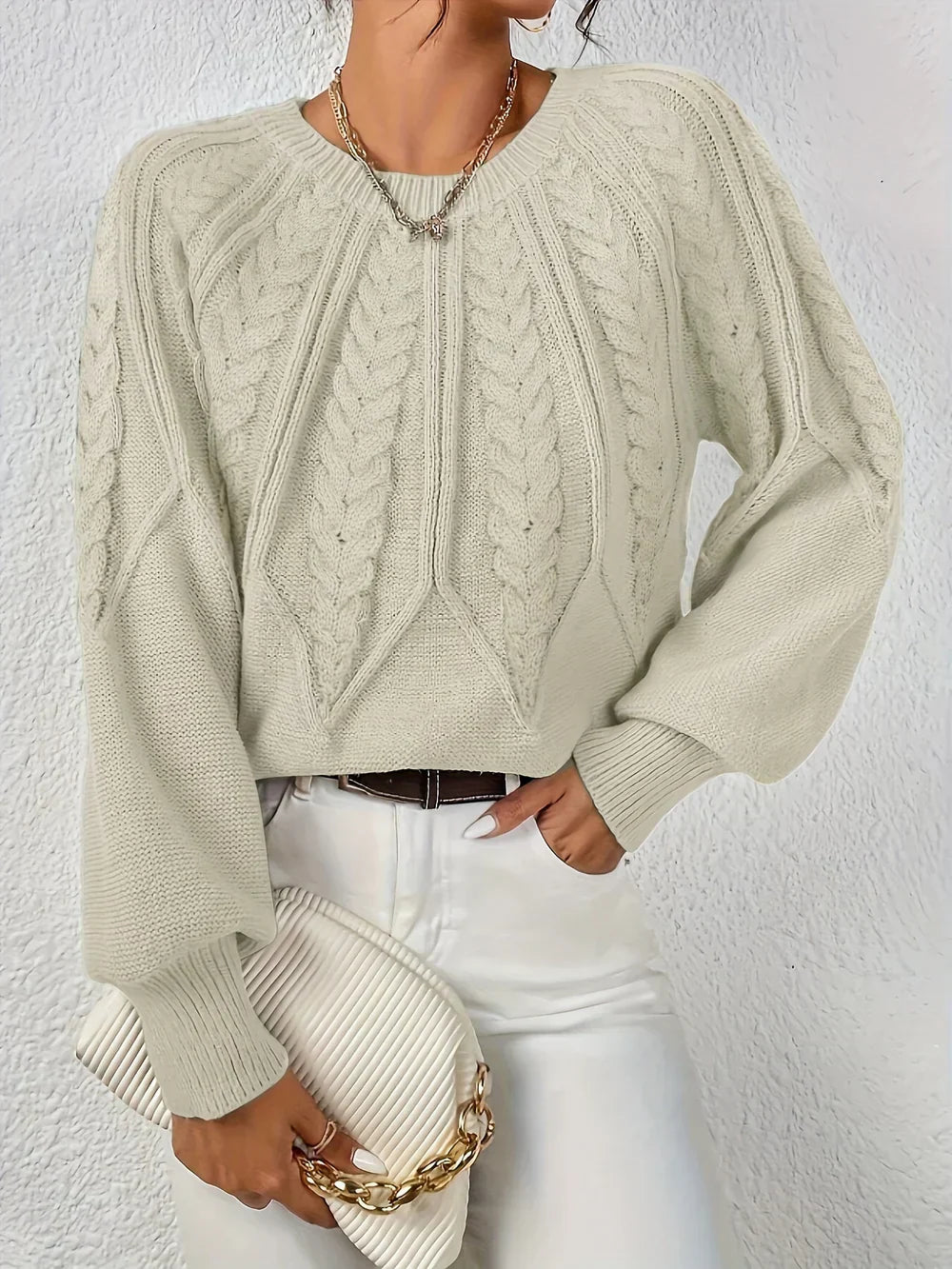 Classic comfort sweater in cream with cable knit texture, crew neck, long sleeves