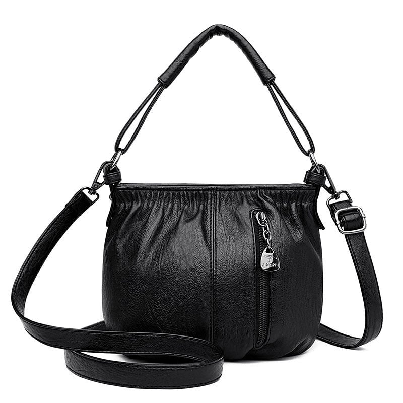 Black multi-layer handbag with gathered front, top handles, and crossbody strap