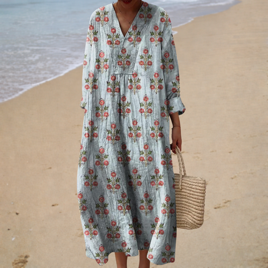 Floral printed summer dress in light blue with V-neck and long sleeves