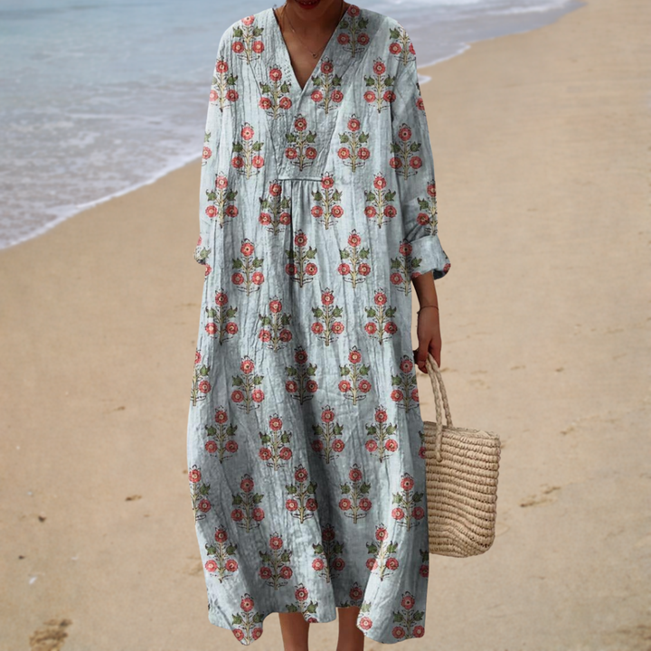 Floral printed summer dress in light blue with V-neck and long sleeves