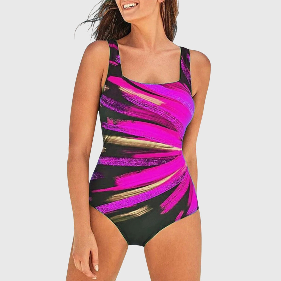 Shaping swimsuit with pink and purple brush-stroke stripes on black, scoop neck