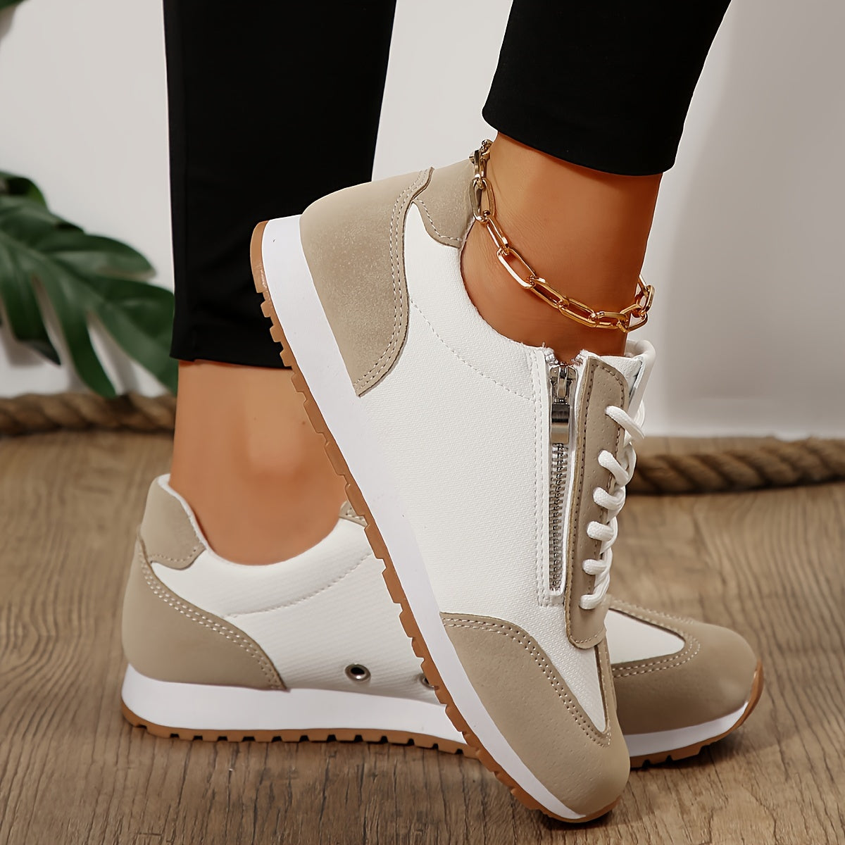 Casual high-top sneakers, white with beige panels, side zipper and ankle chain.