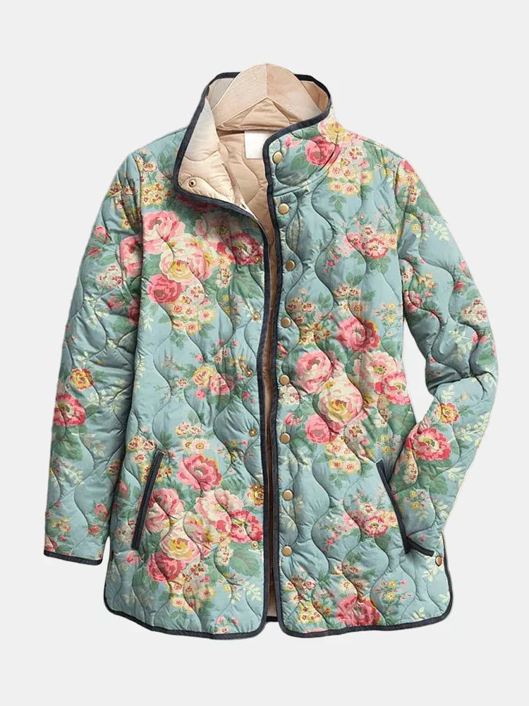 Quilted floral print jacket, light blue with pink flowers and black trim, full zip