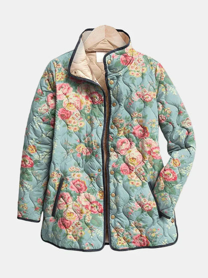 Quilted floral print jacket, light blue with pink flowers and black trim, full zip