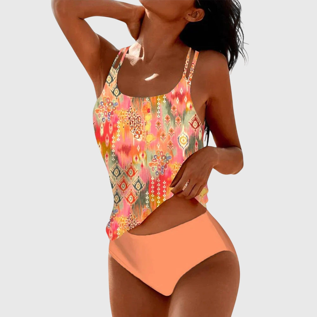 Colorful patterned tank-style swimwear set with solid peach brief bottom and thin straps