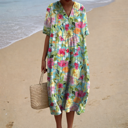 Floral summer dress with V-neck, short sleeves, and elastic waist in multicolor