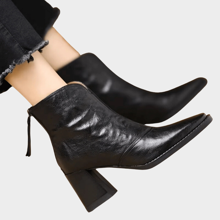 Black heeled ankle boots with side tie detail and block heel