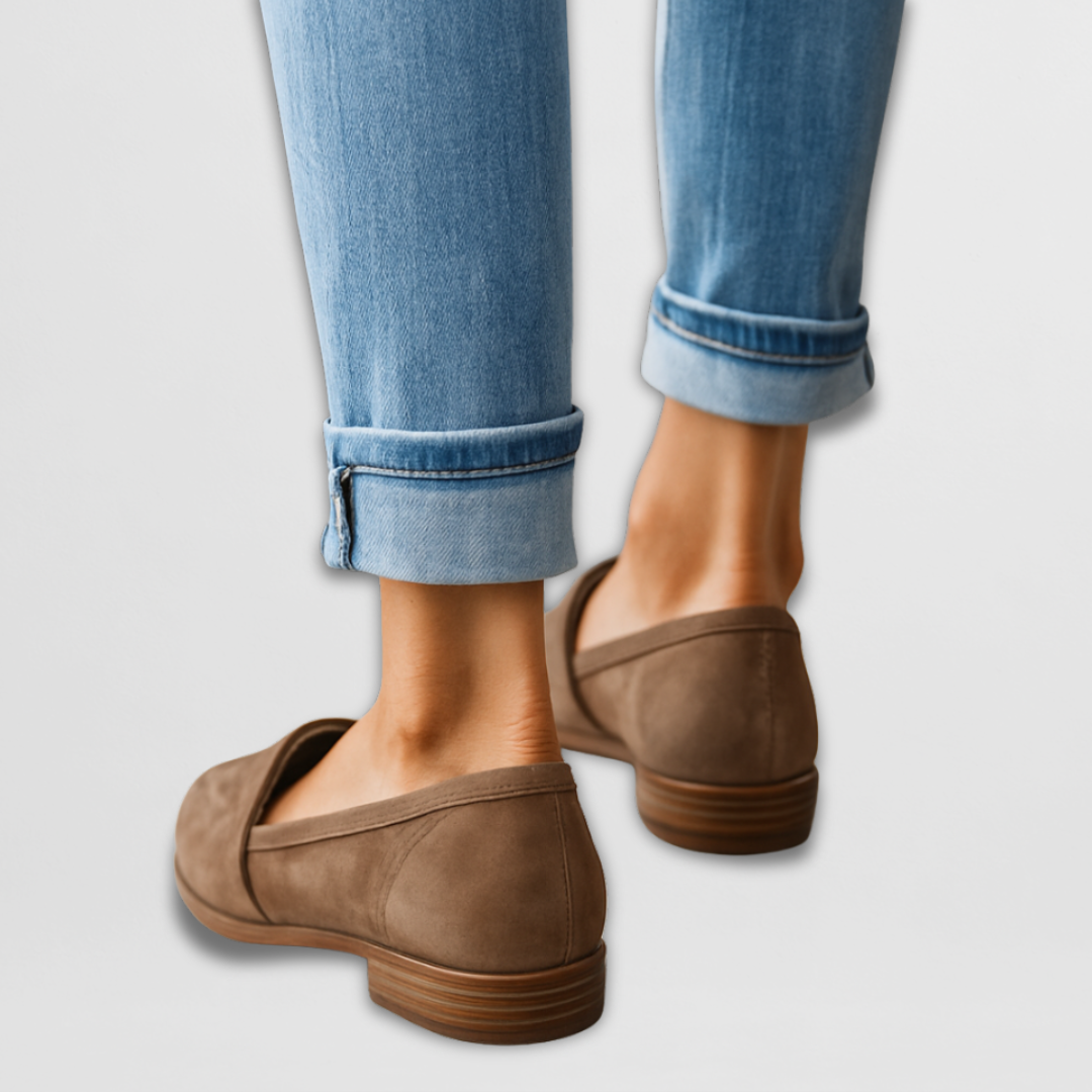 Brown suede loafers with slip-on strap and stacked heel