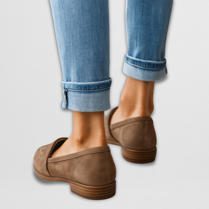 Brown suede loafers with slip-on strap and stacked heel