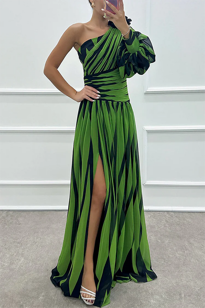 One-shoulder maxi dress in green with dark stripes, ruffled shoulder, side slit