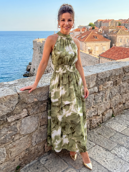 Green abstract print halter midi dress with gathered waist, full length