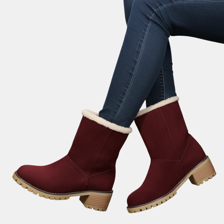 Ankle boots in burgundy with cream faux-fur cuff and block heel, lug sole