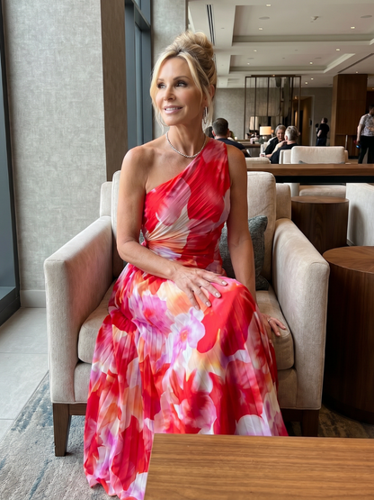 One-shoulder floral midi dress with pleated bodice and red-pink multicolor print