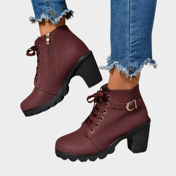 Red wine block-heel ankle boots with lace-up front and side zipper.