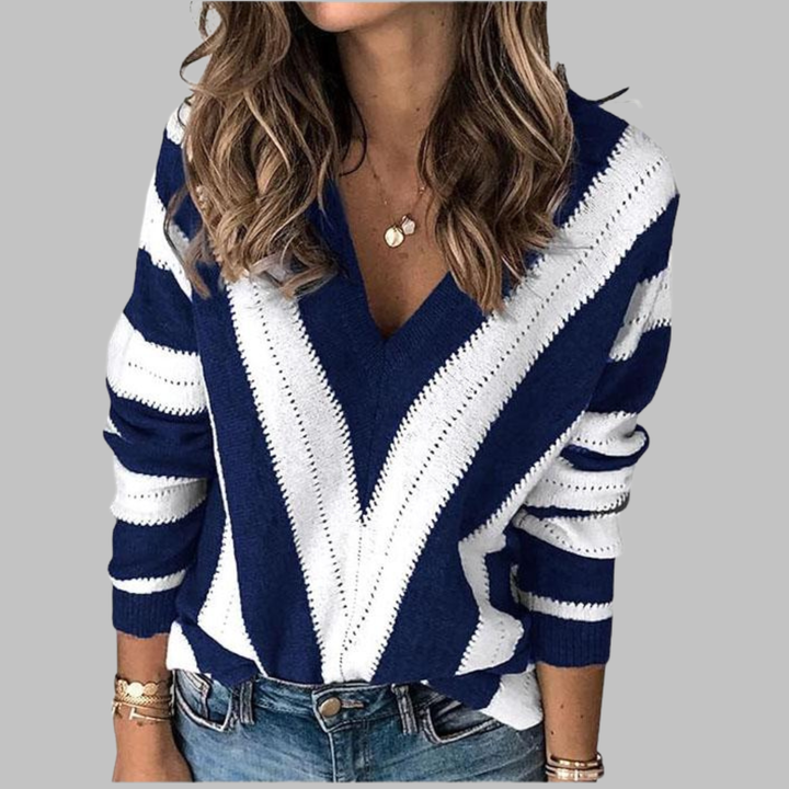Blue V-neck striped long-sleeve sweater with white chevron zigzag stripes