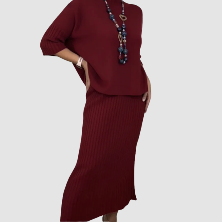 Burgundy relaxed knit top and ribbed midi skirt set with beaded heart necklace