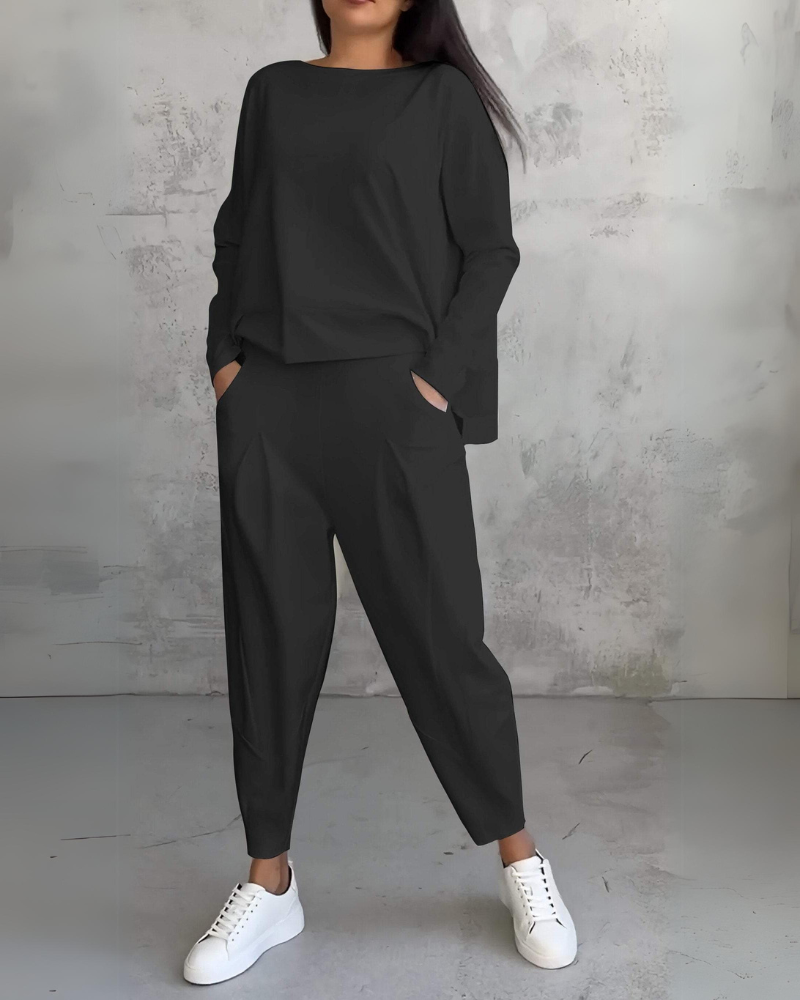 Black lounge set: long-sleeve pullover top with matching tapered trousers