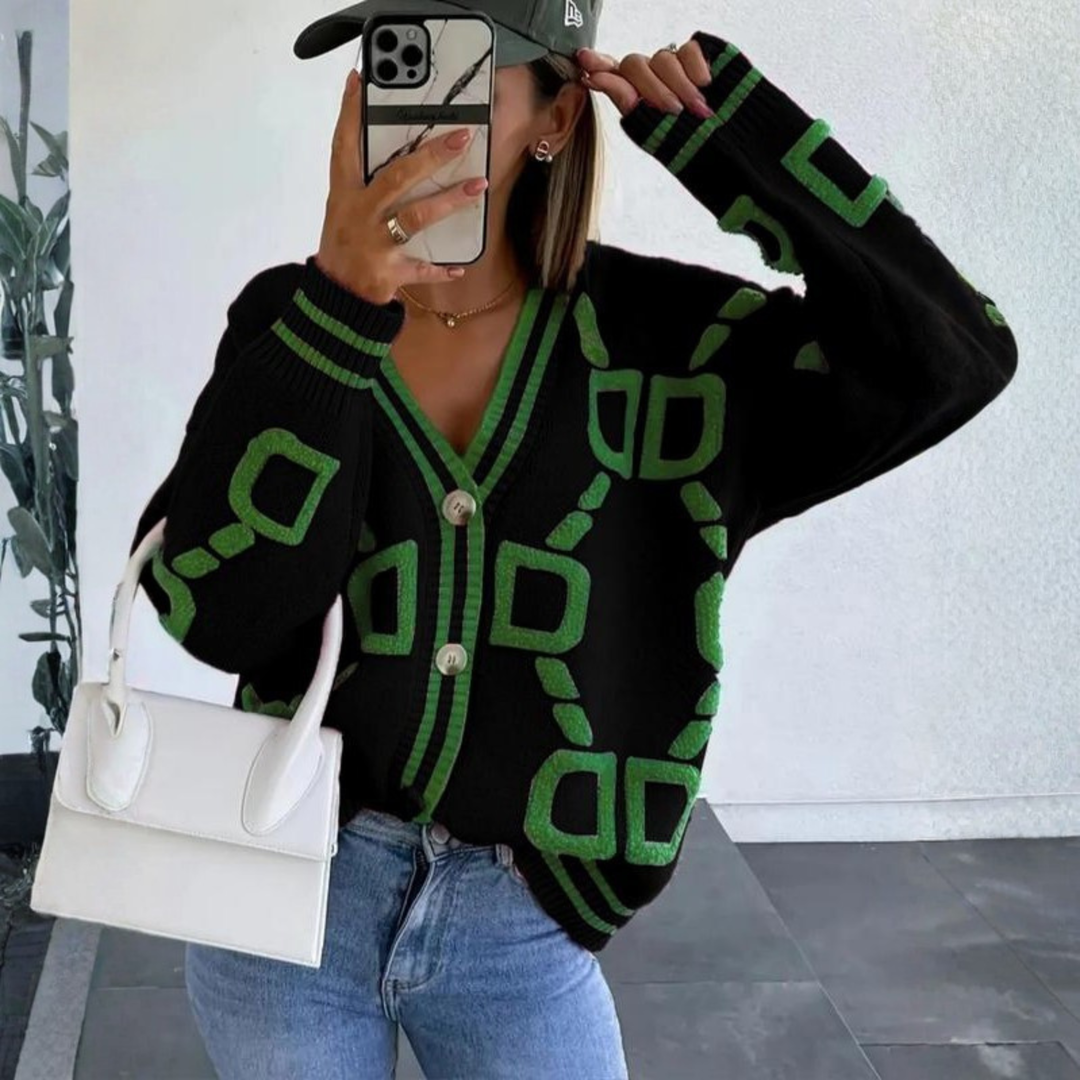 Black button-down cardigan with green geometric pattern, V-neck, long sleeves, button front